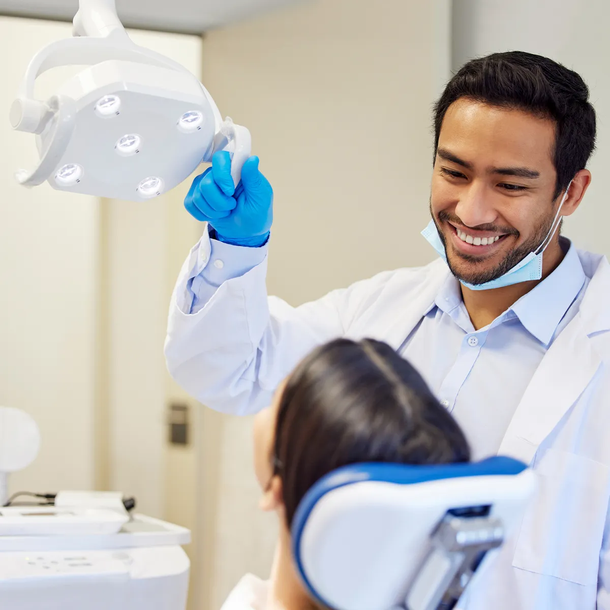 Dentist smiling at patient