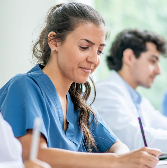 Nurse completing continuing education coursework